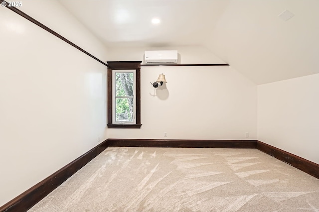 1203 SE 53rd Ave, Portland, OR 97215 - unfurnished room with carpet floors, an AC wall unit, recessed lighting, and lofted ceiling