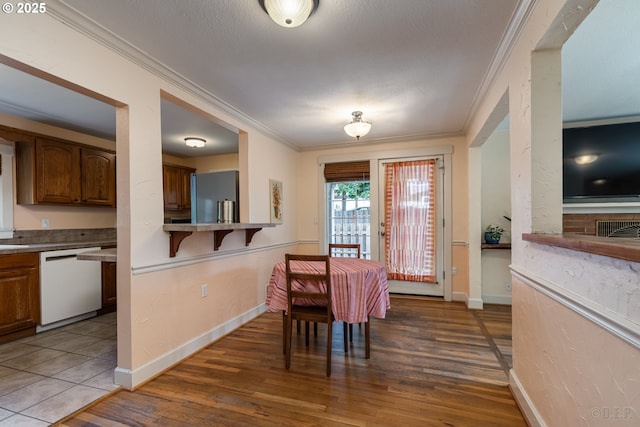 11005 SW 35th Ave, Portland, OR 97219 - dining space with crown molding and wood finished floors