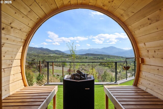 balcony featuring a mountain view and a rural view