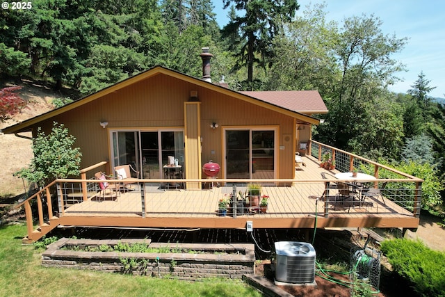 1056 NE Orchard Dr, Myrtle Creek, OR 97457 - rear view of house with outdoor dining area and a wooden deck