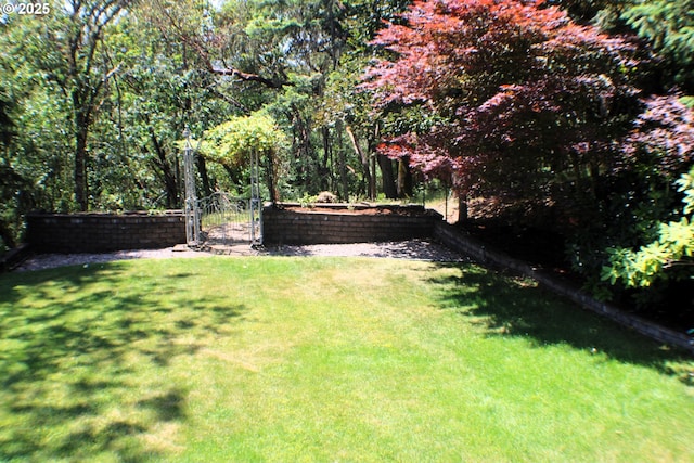 1056 NE Orchard Dr, Myrtle Creek, OR 97457 - view of green lawn featuring a gate