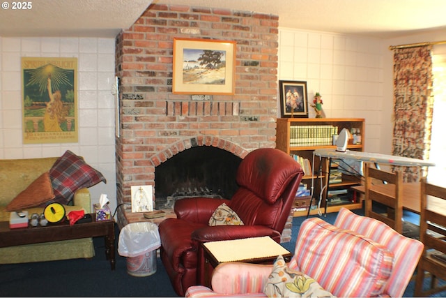1056 NE Orchard Dr, Myrtle Creek, OR 97457 - living area featuring a brick fireplace, tile walls, and a textured ceiling