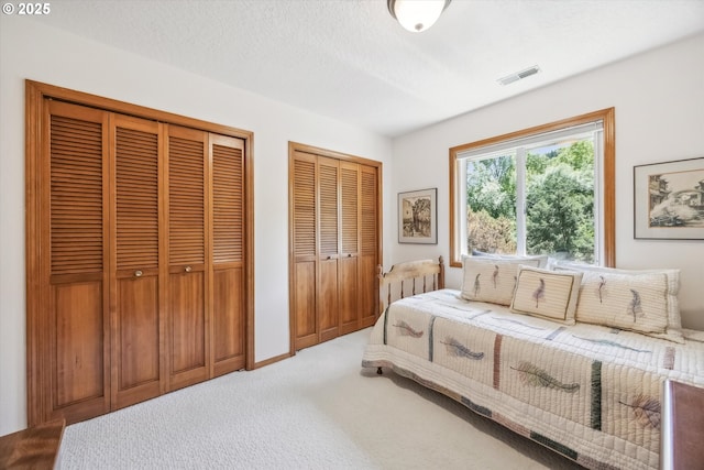 562 SW Eastman Pkwy, Gresham, OR 97080 - carpeted bedroom with multiple closets