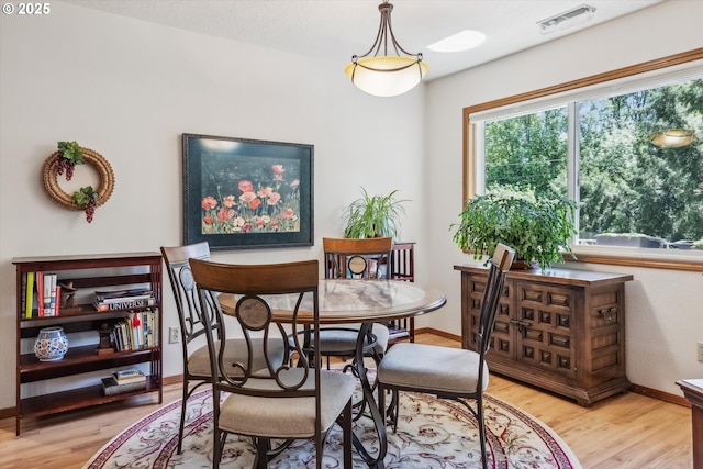 562 SW Eastman Pkwy, Gresham, OR 97080 - dining area with light wood finished floors and baseboards