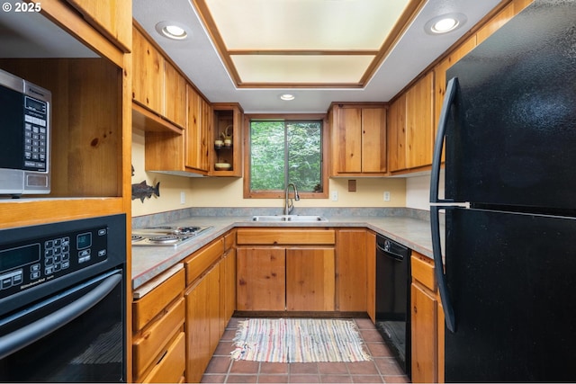70198 E Barlow Trail Rd, Rhododendron, OR 97049 - kitchen with black appliances, light countertops, tile patterned flooring, brown cabinets, and recessed lighting