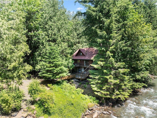 70198 E Barlow Trail Rd, Rhododendron, OR 97049 - view of yard featuring a forest view and a deck with water view