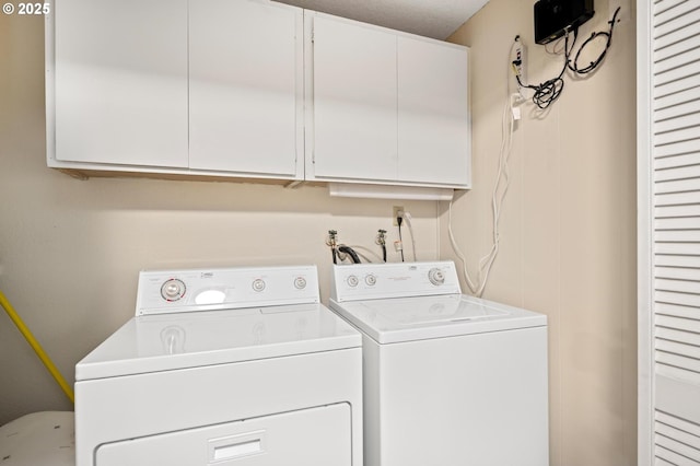 70198 E Barlow Trail Rd, Rhododendron, OR 97049 - laundry room with cabinet space and washer and dryer