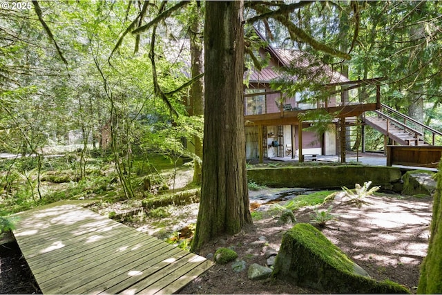 70198 E Barlow Trail Rd, Rhododendron, OR 97049 - view of yard featuring stairs and a wooden deck