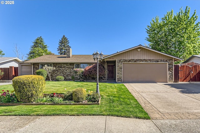 single story home with a garage, a front lawn, fence, a chimney, and driveway