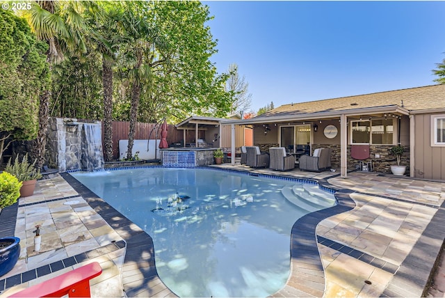 view of pool featuring an outdoor hangout area, a fenced in pool, a fenced backyard, and a patio