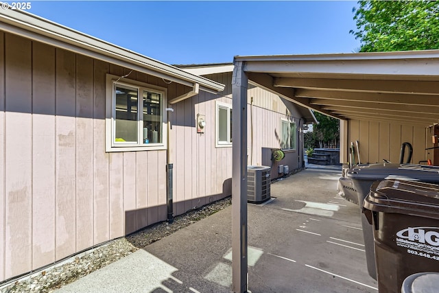view of property exterior with central AC