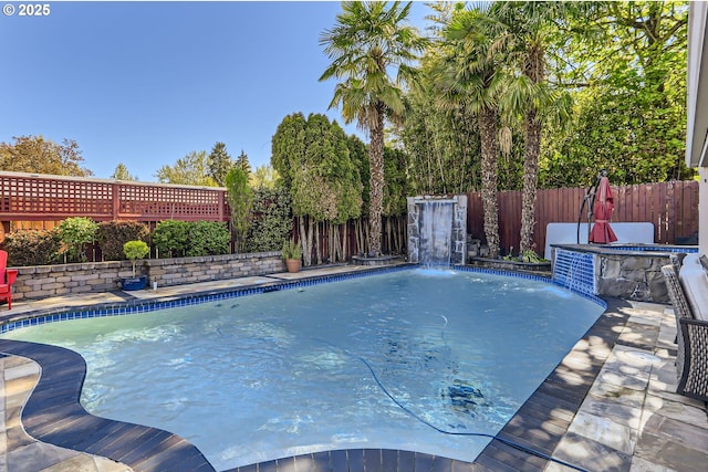 view of swimming pool featuring a fenced in pool and a fenced backyard