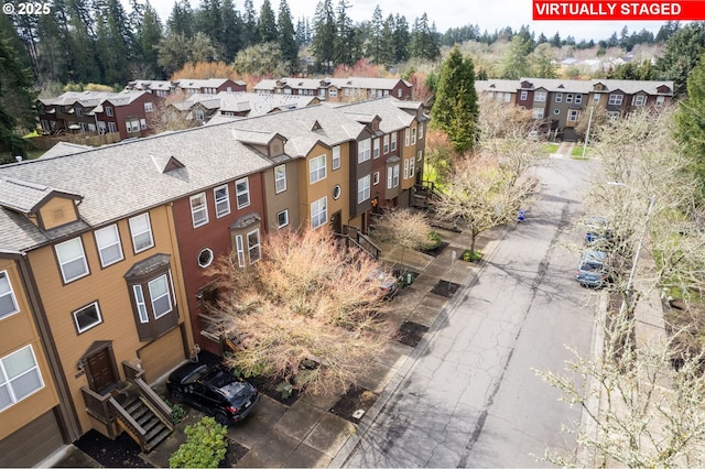 birds eye view of property featuring a residential view