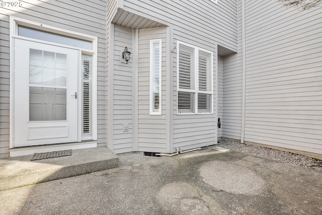 entrance to property with a patio area