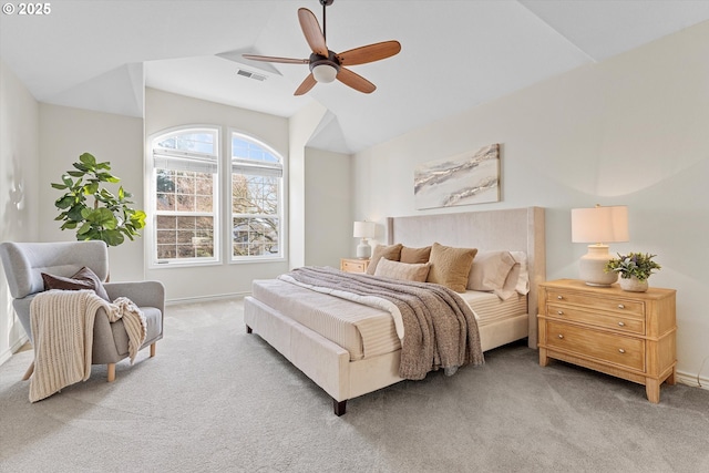 carpeted bedroom featuring visible vents, baseboards, and a ceiling fan