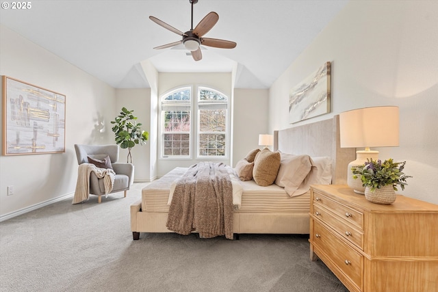 bedroom with ceiling fan, baseboards, and carpet floors