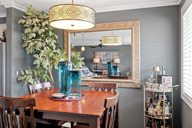 440 S Cascade Dr, Woodburn, OR 97071 - dining room featuring ceiling fan and ornamental molding