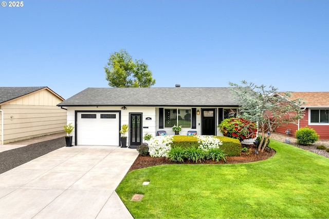 440 S Cascade Dr, Woodburn, OR 97071 - ranch-style home featuring an attached garage, a front yard, concrete driveway, and a shingled roof