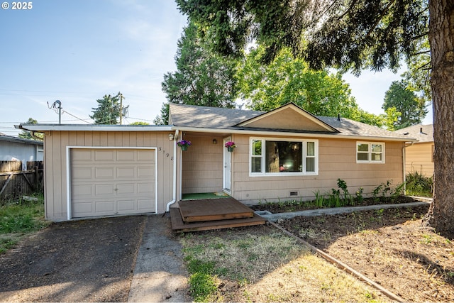 3198 Pheasant Blvd, Springfield, OR 97477 - ranch-style home featuring an attached garage, crawl space, asphalt driveway, and a shingled roof