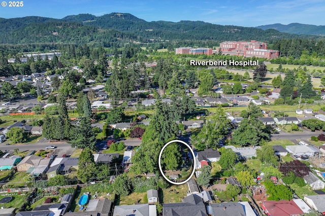 3198 Pheasant Blvd, Springfield, OR 97477 - view of property location with a mountainous background and a forest