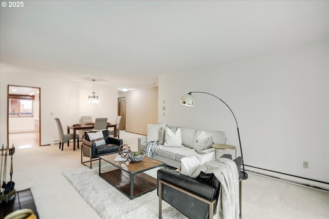 living area with light colored carpet, a baseboard radiator, and a chandelier