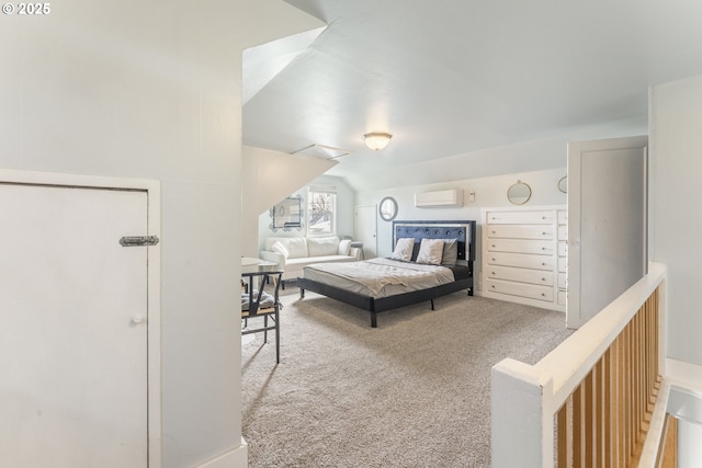 bedroom with carpet flooring, a wall mounted air conditioner, and vaulted ceiling