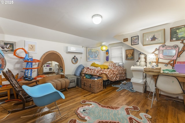 bedroom featuring arched walkways, an AC wall unit, lofted ceiling, and wood finished floors