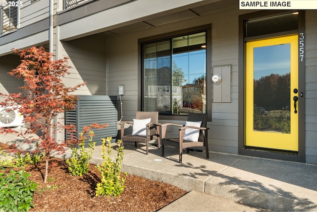 property entrance featuring a patio area