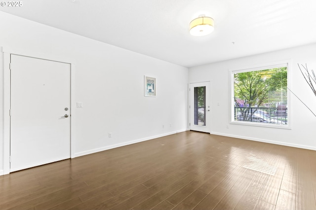 3963 N Montana Ave Unit 1, Portland, OR 97227 - unfurnished room featuring baseboards and dark wood-type flooring