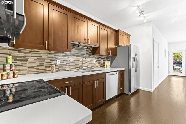 3963 N Montana Ave Unit 1, Portland, OR 97227 - kitchen featuring stainless steel appliances, a sink, light countertops, and backsplash