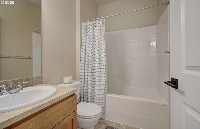 full bathroom featuring vanity, shower / tub combo, and toilet