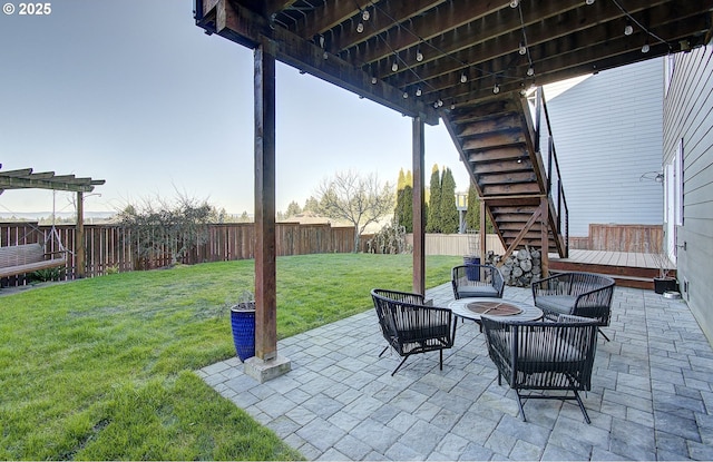 view of patio / terrace with an outdoor fire pit