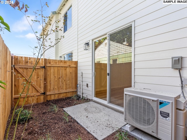 exterior space featuring ac unit