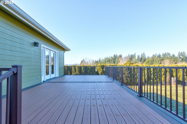 wooden deck featuring french doors