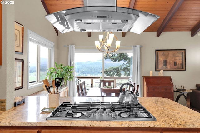 kitchen featuring stainless steel gas cooktop, a chandelier, ventilation hood, light stone counters, and wooden ceiling