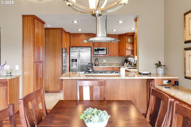 kitchen with stainless steel appliances, brown cabinets, light stone counters, and recessed lighting