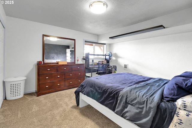 bedroom with light colored carpet