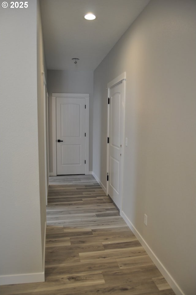 1028 Forest Heights St, Sutherlin, OR 97479 - corridor featuring wood finished floors and recessed lighting