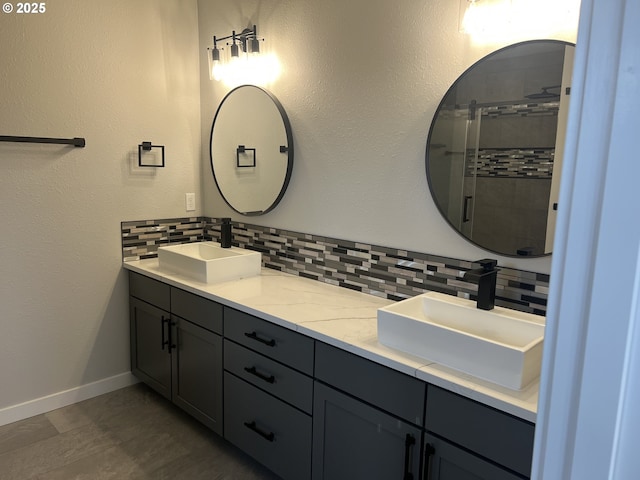 1028 Forest Heights St, Sutherlin, OR 97479 - full bathroom with backsplash, double vanity, and a tile shower