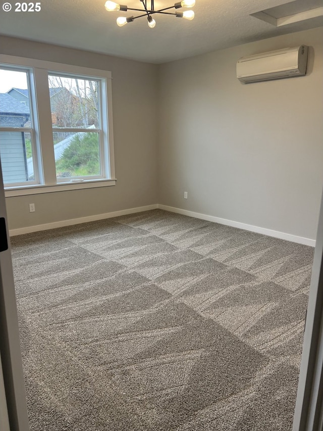 1028 Forest Heights St, Sutherlin, OR 97479 - carpeted spare room with a wall mounted AC and a chandelier