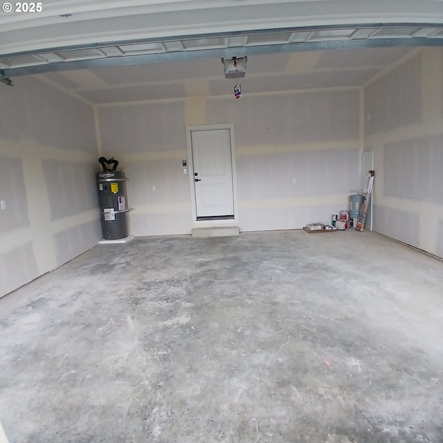 1028 Forest Heights St, Sutherlin, OR 97479 - garage with strapped water heater and a garage door opener