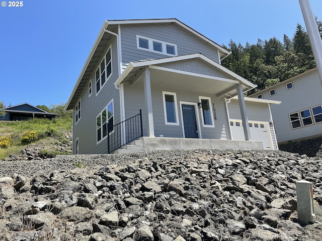 1028 Forest Heights St, Sutherlin, OR 97479 - view of front of house with covered porch and a garage