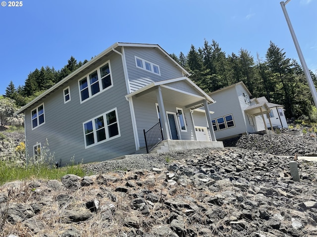 1028 Forest Heights St, Sutherlin, OR 97479 - view of front of property with a garage and a porch