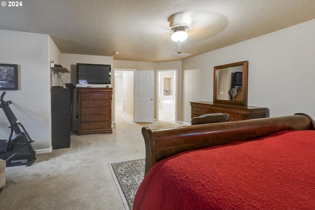 bedroom with a textured ceiling and ceiling fan