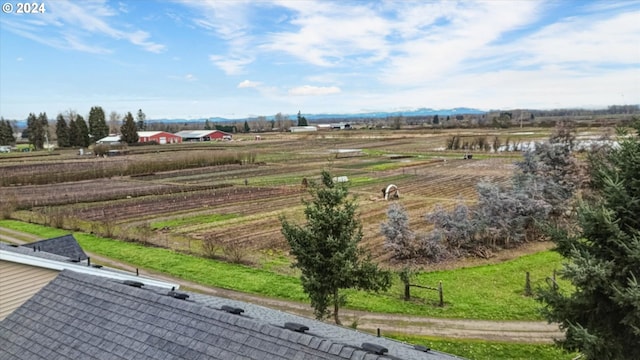 birds eye view of property featuring a rural view