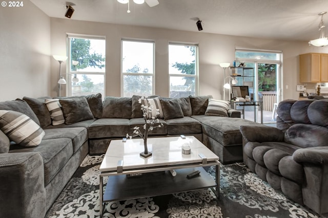 living room featuring ceiling fan