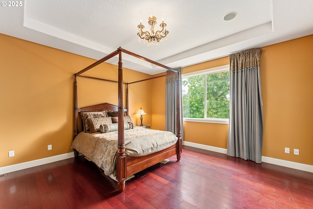 3356 NW 153rd Ter, Portland, OR 97229 - bedroom featuring hardwood / wood-style flooring and a tray ceiling