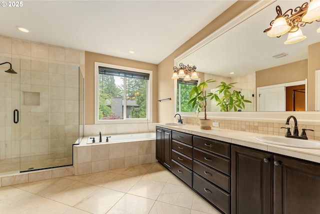 3356 NW 153rd Ter, Portland, OR 97229 - full bath featuring double vanity, a stall shower, tile patterned floors, a garden tub, and backsplash