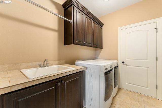 3356 NW 153rd Ter, Portland, OR 97229 - laundry room featuring cabinet space, independent washer and dryer, and light tile patterned floors