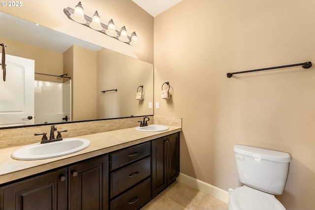 3356 NW 153rd Ter, Portland, OR 97229 - bathroom featuring double vanity, tile patterned floors, tasteful backsplash, and a shower